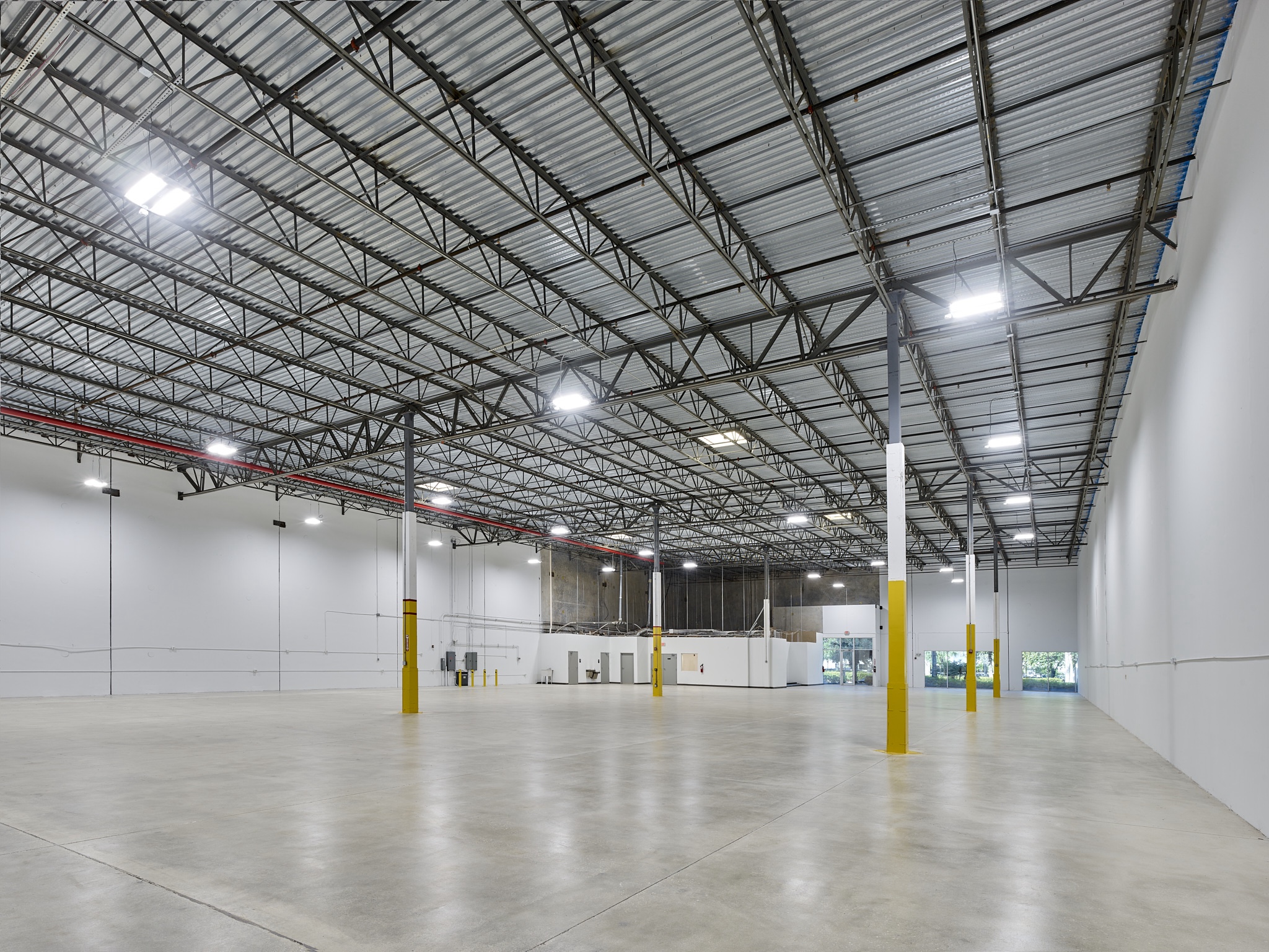 Industrial interior with polished concrete flooring in Boynton Beach, Florida